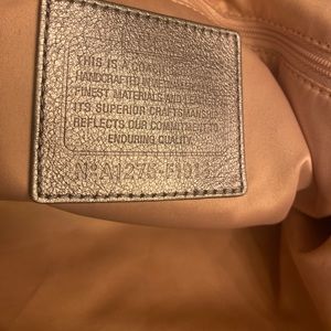 Gray and silver coach bag